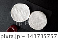 Brie or Camembert cheese is a white, round shape for baking and melting. Camembert cheese 143735757