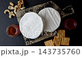 Brie or Camembert cheese is a white, round shape for baking and melting. Camembert cheese 143735760