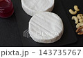 Brie or Camembert cheese is a white, round shape for baking and melting. Camembert cheese 143735767