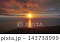 Sun setting over calm sea natural landscape 143738999