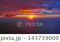 Sun setting over calm sea natural landscape 143739000