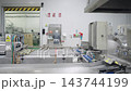 Mussel cans moving on an automated production line 143744199