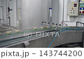 Mussel cans moving on a factory conveyor belt during production 143744200