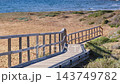Beach With Wooden Path To Sea Water. 143749782