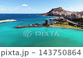 Castelsardo harbor and medieval hilltop castle in Sardinia, Italy 143750864