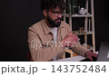 Stressed businessman feeling tired working on laptop 143752484