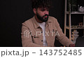 Stressed indian man working on laptop crying and feeling sad 143752485