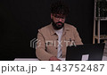 Young businessman participating in a video conference call 143752487
