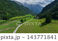 landscape with mountains stunning summer scenery with alpine meadows and mountains in slovenia logarska dolina and alpine forest with green fields from solcava panoramic road 143771841