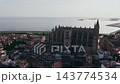Aerial Panorama Of Historic Cathedral Beside Waterfront In Palma De Mallorca, Bathed In Warm Evening Light. 143774534