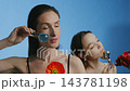 Innovative skincare techniques showcased with models and natural elements 143781198