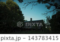 Timelapse of an Old Rural Wooden Cottage Surrounded by Summer Trees 143783415