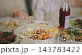 Assorted Cheese and Savory Appetizers Served on a Banquet Table 143783422
