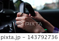 Close-up of the hands of a driver 143792736