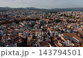 Mallorca City Spreads Beneath Warm Evening Light As Drone View Passes Above Terracotta Roofs And Streets. 143794501