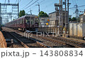 A Hankyu Takarazuka Line 7000 series train running near Ikeda-Ishibashi in the morning. 143808834
