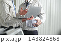 A group of male workers in a meeting. Construction, engineering, factory, contractors, consultation, meeting, DX, repair, inspection, architecture, interior. 143824868