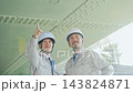 Workers inspecting equipment. Construction, inspection, repair, maintenance, upkeep, building, teamwork, contractors, personnel, safety 143824871