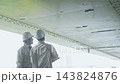 Workers inspecting equipment. Construction, inspection, repair, maintenance, upkeep, building, teamwork, contractors, personnel, safety 143824876