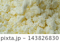 Cottage cheese falling onto a heap in slow motion macro 143826830