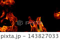 Fire and glowing sparks captured in extreme super slow motion at 1000fps on a cinematic high-speed camera against a pure black background, creating a dramatic VFX overlay. 143827033