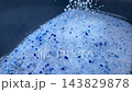 Silica gel cat litter crystals close up in slow motion 143829878