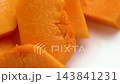 Fresh pumpkin chunks on white plate 143841231