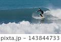 Surfer men during surfing on blue wave. High quality 4k footage 143844733