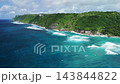 Scenic landscape with cliffs on coastline with ocean and waves in Bali. Aerial view. High quality 4k footage 143844822