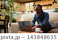 Smiling woman clapping hands overjoyed with good news, receiving promotion and career achievement at home. Uplifting ambitious person showing satisfaction and gratitude. 143848635
