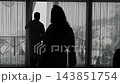 Couple Silhouettes Hugging by Window With Snowy Mountain View. 143851754