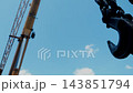 Heavy Duty Crane Hooks and Chains at Industrial Worksite. 143851794