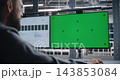 Technology Professional Analyzing Network Operations with Customizable Screen 143853084