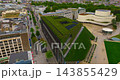 Aerial view of the beautiful city of Dusseldorf on the banks of the Rhine, featuring modern architecture and commercial port waterways 143855429
