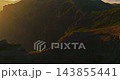 Aerial view of beautiful, picturesque sunset at a mountain peak overlooking the mountains on the island of Madeira, Portugal 143855441