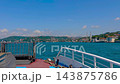 Sailing on Bosphorus toward Istanbul shoreline and hills 143875786