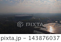 Aerial Drone Footage of Warsaw Cityscape at Sunrise featuring National Stadium, Bridges, and Vistula River 143876037