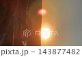 Vertical video. Sunset over a city bridge with cars in a vertical outdoor view. Urban commute, golden hour transport and warm city background 143877482