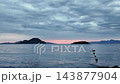 Magnificent sunset on a cloudy day over the Aegean Sea in autumn 143877904
