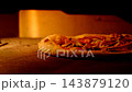 Freshly Prepared Pizza Cooking in a Professional Oven. 143879120