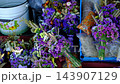 Colorful Decorative Bouquets of Dried and Fresh Flowers with Purple Blooms and Natural Herbs Displayed for Sale at Bakota Ukraine 143907129