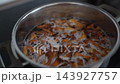 boiled forest mushrooms 143927757