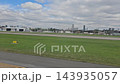 Buenos Aires, Argentina - October 11, 2026: View from a passenger airplane window during taxiing, showing airport pavement, markings and surrounding grounds before departure. 143935057