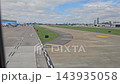 Buenos Aires, Argentina - October 11, 2026: View from a passenger airplane moving through the airport, showing intersecting paved taxiways and ground markings during taxiing. 143935058