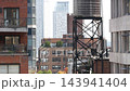 New York City Midtown East urban residential buildings, Manhattan rooftop, USA. Water towers on roof 143941404