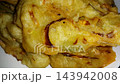 Crispy Indonesian Bakwan Fritters Close-up, Delicious Savory Street Food. a popular savory street food snack. 143942008