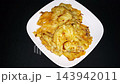 Top Down to Close-up of Golden Fried Vegetable Fritters. This traditional Indonesian snack is perfect for culinary projects, food 143942011