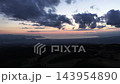静岡県函南町・沿岸丘陵と田畑の夕暮れ空撮 143954890