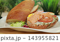 Open sandwich with salted salmon, quail eggs and cream cheese 143955821