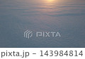 Sparkling snow at sunset close up 143984814